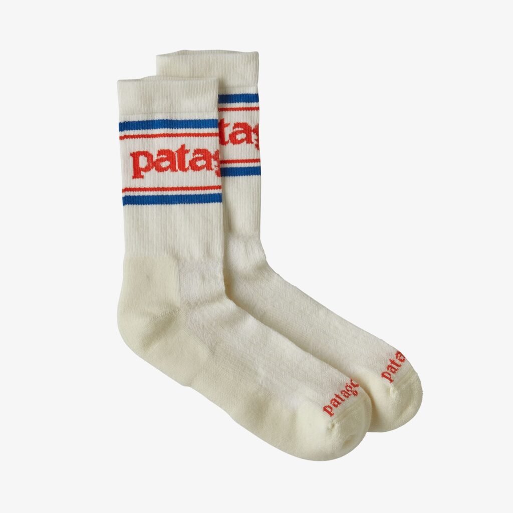 Patagonis white socks with Patagonia logo on top of socks