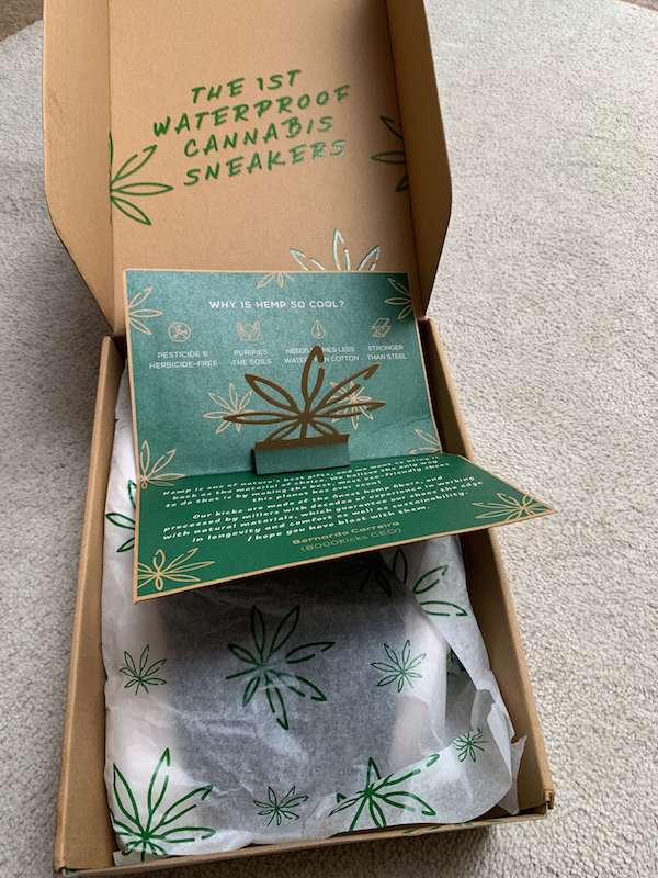 Inside the 8000kicks sneakers shoe box, featuring the information card